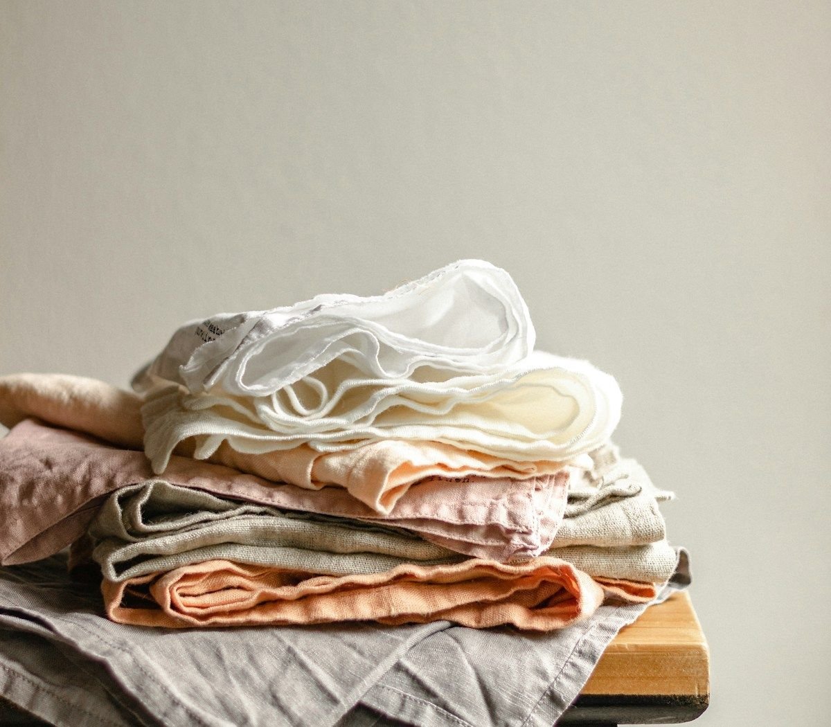 Organized clean white linens and household items
